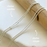 Comparaison des chaînes pour bola : chaîne satellite avec petites billes ou chaîne simple, en acier inoxydable argenté.