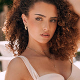 Colliers superposés en acier inoxydable doré: ras de cou perlé, chaîne fine étoile, pendentif minimaliste. Femme.